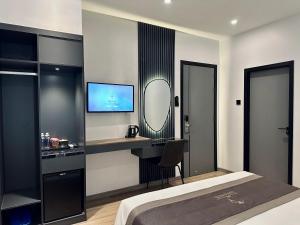 Postel nebo postele na pokoji v ubytování LION 15 Hotel