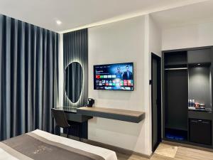 TV a/nebo společenská místnost v ubytování LION 15 Hotel