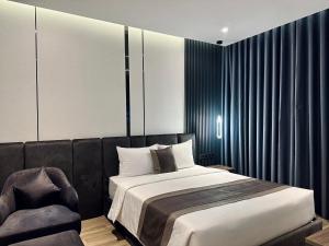 Postel nebo postele na pokoji v ubytování LION 15 Hotel