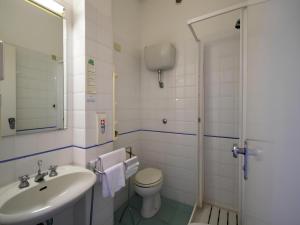 Koupelna v ubytování Hotel Serapo
