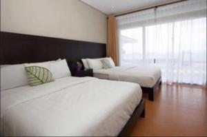 Postel nebo postele na pokoji v ubytování Playa Ignacio Resort