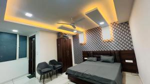 Ένα ή περισσότερα κρεβάτια σε δωμάτιο στο Hotel RUTBA