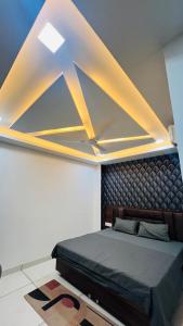 Ένα ή περισσότερα κρεβάτια σε δωμάτιο στο Hotel RUTBA