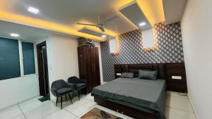 Ένα ή περισσότερα κρεβάτια σε δωμάτιο στο Hotel RUTBA