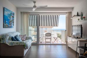 Posezení v ubytování AT020 Apartamento con preciosas vistas de la playa La Paella