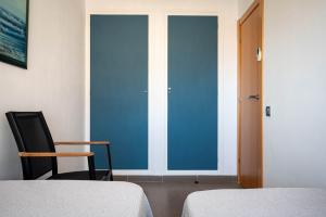 Postel nebo postele na pokoji v ubytování AT020 Apartamento con preciosas vistas de la playa La Paella