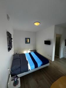 Postel nebo postele na pokoji v ubytování Valdagno 11 B&B