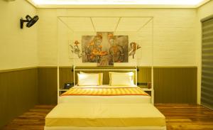 Postel nebo postele na pokoji v ubytování Amba Yaalu - Thema Collection "The first women-led hotel in Sri Lanka"