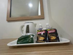 Příslušenství pro přípravu čaje a kávy v ubytování Mint Hotel + 37 fotografií