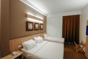 Postel nebo postele na pokoji v ubytování Fomecs Boutique Hotel, Jonker Street + 37 fotografií