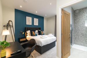 Ένα ή περισσότερα κρεβάτια σε δωμάτιο στο Chelmsford Loft 8