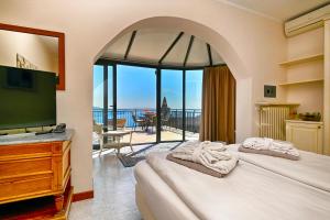 Voodi või voodid majutusasutuse Hotel Gallo toas