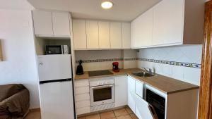 A kitchen or kitchenette at AR27-4 Impresionantes vistas al mar.
