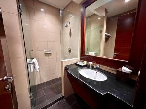 Koupelna v ubytování Manado Quality Hotel + 37 fotografií