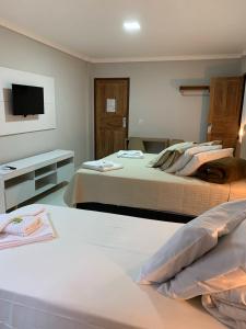 Ένα ή περισσότερα κρεβάτια σε δωμάτιο στο Hotel Pierazzo