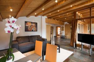 TV a/nebo společenská místnost v ubytování Residence Mugun