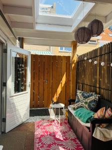 Posezení v ubytování Cosy summerhouse