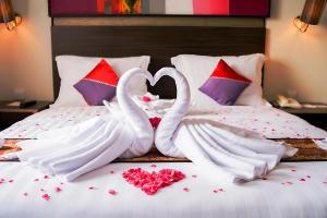 BRITS HOTEL PANGKALAN BUN客房内的一张或多张床位