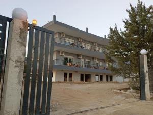 a building with a gate in front of it at Villa Athina 1 in Serres