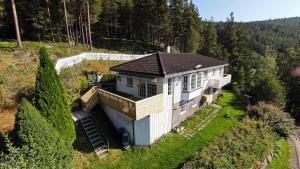 an overhead view of a house on a hill at ThePearl in Sel