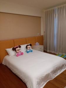 Voodi või voodid majutusasutuse Tu Wei 192 Homestay toas