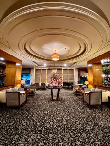 TV a/nebo společenská místnost v ubytování Manado Quality Hotel
