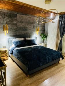 En eller flere senge i et værelse på EVVA Apartment Mountain Retreat