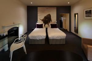 Postel nebo postele na pokoji v ubytování B+B Edinburgh
