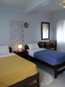 Postel nebo postele na pokoji v ubytování My Hostel Boracay