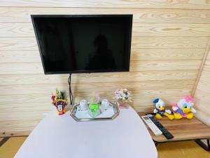 TV a/nebo společenská místnost v ubytování 旅馆yo ko