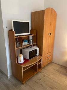 TV a/nebo společenská místnost v ubytování Zu Hause