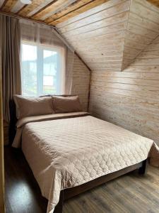 Postel nebo postele na pokoji v ubytování Vinor Cottage + 32 fotografií