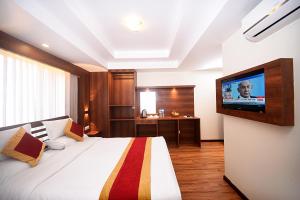 TV o dispositivi per l'intrattenimento presso Hotel Friends Home