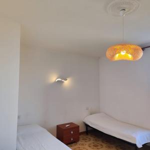 Ένα ή περισσότερα κρεβάτια σε δωμάτιο στο Villa Bianca