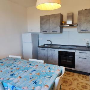 Η κουζίνα ή μικρή κουζίνα στο Villa Bianca