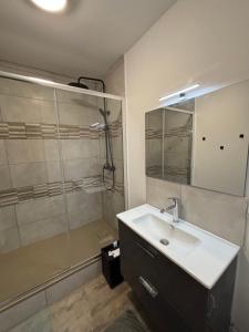 Ένα μπάνιο στο Dunes dorées appartement de charme avec belle vue