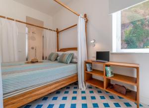 Ένα ή περισσότερα κρεβάτια σε δωμάτιο στο Maison Marika