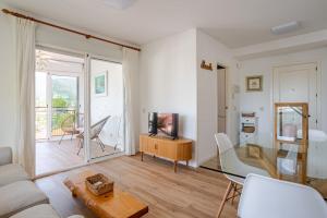 TV a/nebo společenská místnost v ubytování Apartamento en Voramar a 2 minutos de la playa