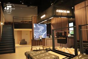 TV a/nebo společenská místnost v ubytování Aroma Chew Hotel