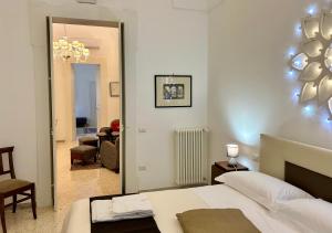 A bed or beds in a room at B&B Don Alessandro