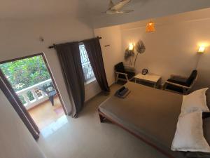 SHANKAR by the SEA, 2 min from Mandrem Beach客房内的一张或多张床位