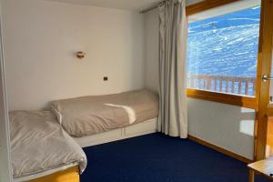 Postel nebo postele na pokoji v ubytování Studio with balcony in Plagne Village