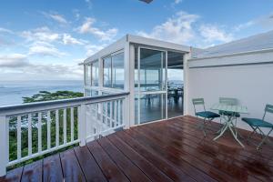 a balcony with a view of the ocean at Domaine To'a Hotu Iti in Tohautu
