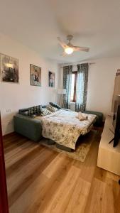 Postel nebo postele na pokoji v ubytování Casa da Taty