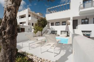a view of a villa with a pool at Villa Amy Agios Prokopis in Agios Prokopios
