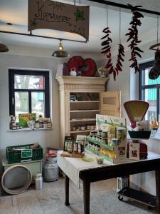 a room with a table with boxes of food on it at Windmühlenhof in Dittmannsdorf