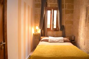 Postel nebo postele na pokoji v ubytování St George of Lydda B&B