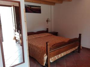 Ein Bett oder Betten in einem Zimmer der Unterkunft Segesta Antichi Sapori