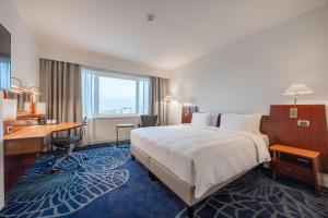 Radisson Blu Hotel Amsterdam Airport, Schiphol客房内的一张或多张床位