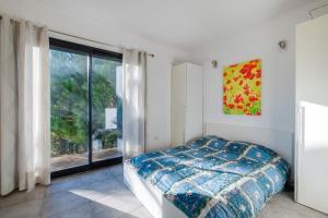 Ένα ή περισσότερα κρεβάτια σε δωμάτιο στο Villa architecte Vue Mer